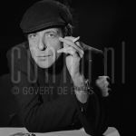 11-12-1985 Leonard Cohen in Rotterdam, The Netherlands. December 11, 1985.

[keywords]Posed, Headshot, Eye contact, Black & White image, Smoking[/keywords]